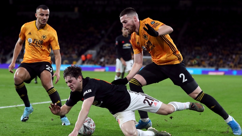 Daniel James and Matt Doherty battle for possession
