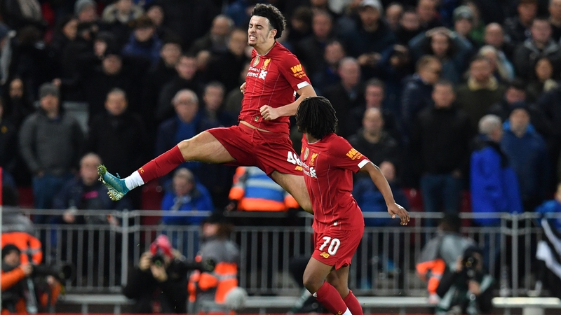 Curtis Jones celebrates his stunning effort which sealed the Merseyside derby