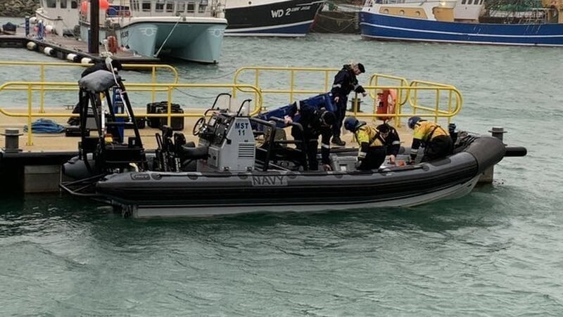 Navy divers loading their gear before heading out to the search site off Hook Head
