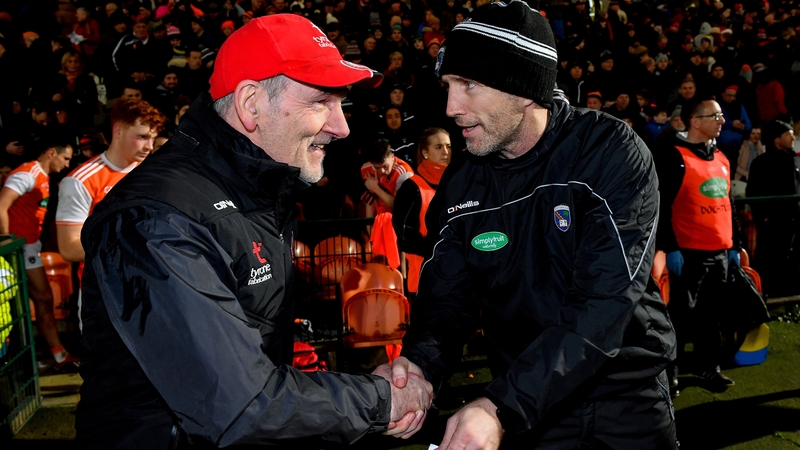 Tyrone supremo Mickey Harte is congratulated by Armagh boss Kieran McGeeney
