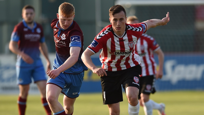 Aaron Molloy in action against Aaron McEneff during his time at Drogheda United