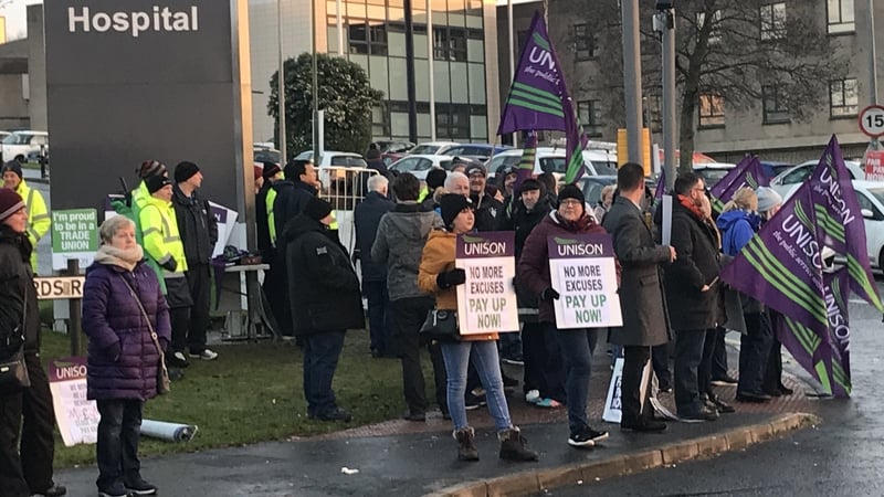 Health workers staging a strike outside Ulster Hospital
