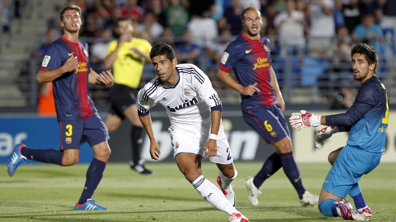 Juanfran Moreno of Real Madrid Castilla celebrates after scoring his team's first goal during the La Liga Adelante match between Real Madrid Castilla and Barcelona B at Estadio Alfredo Di Stefano in 2012