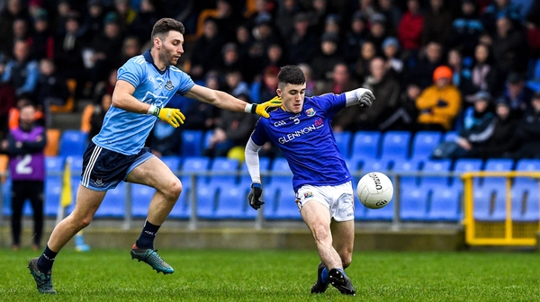 Longford's Iarla O'Sullivan gets a shot away under attention from Dublin's Andy Foley
