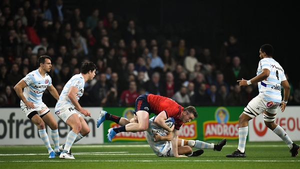 Chris Farrell is tackled by Teddy Iribaren
