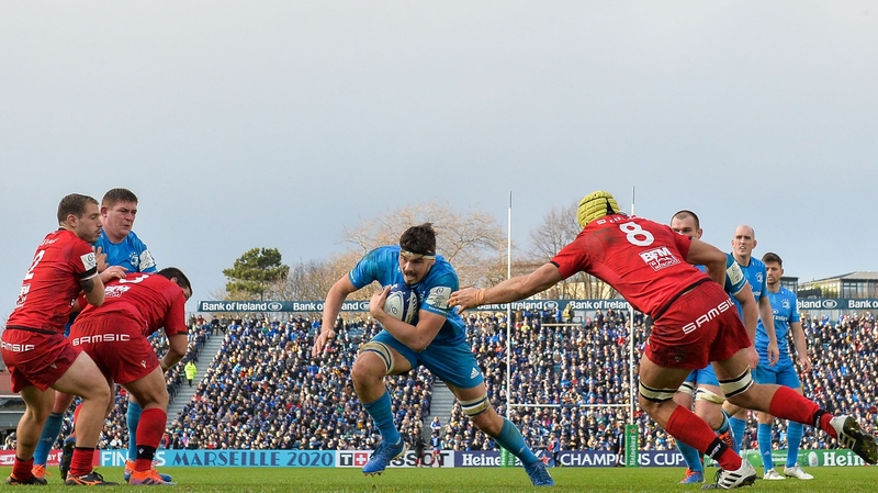 Max Deegan (centre) bursts through to take his try at the RDS