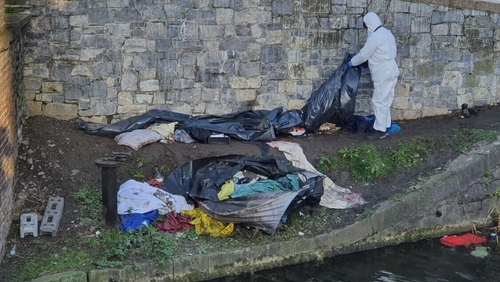 The man was sleeping in a tent on the banks of the Grand Canal
