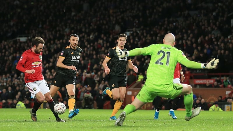 Juan Mata scores the only goal of the game with a composed chip