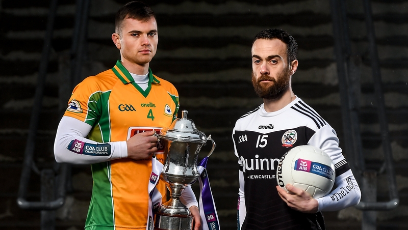 Corofin's Liam Silke, left, with Conor Laverty of Kilcoo