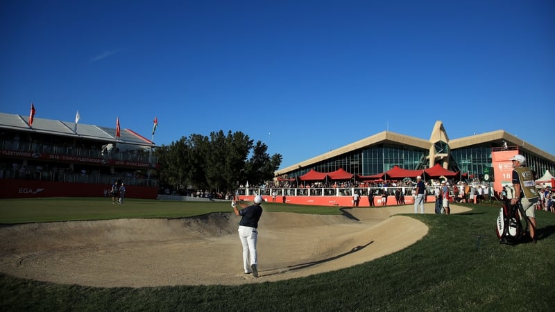 Shane Lowry plays the final hole in Abu Dhabi but ended up with a bogey which looks set to keep him out of the weekend