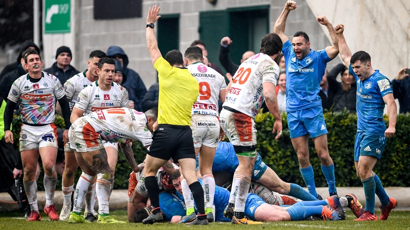 Leinster players Dave Kearney and Luke McGrath celebrate Caelan Doris' try
