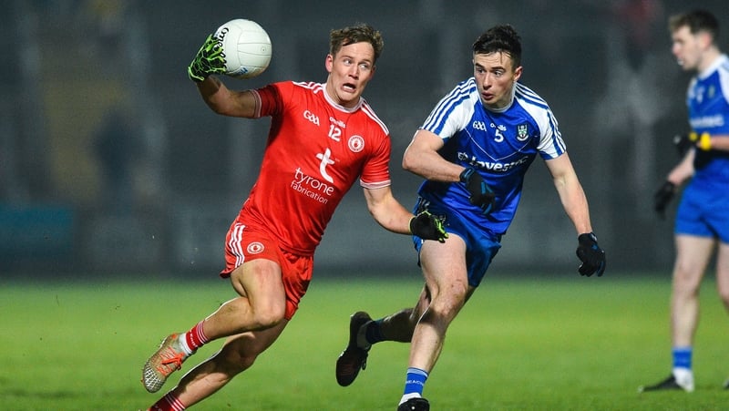 Tyrone's Kieran McGeary escapes the attention of Monaghan's Shane Carey