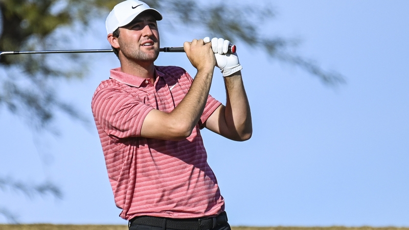 Scottie Scheffler reacts to his shot from the 17th tee