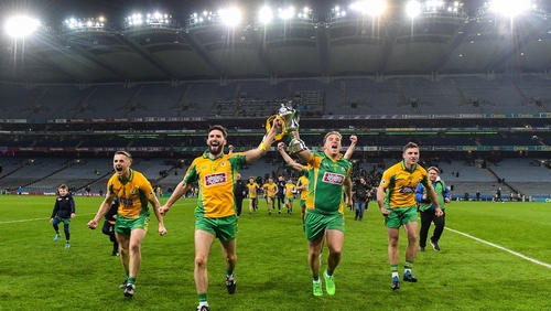 Kieran Molloy, Martin Farragher, Bernard Power and Dylan Wall celebrate with the Andy Merrigan Cup