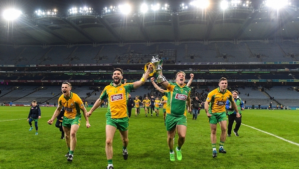 Kieran Molloy, Martin Farragher, Bernard Power and Dylan Wall celebrate with the Andy Merrigan Cup