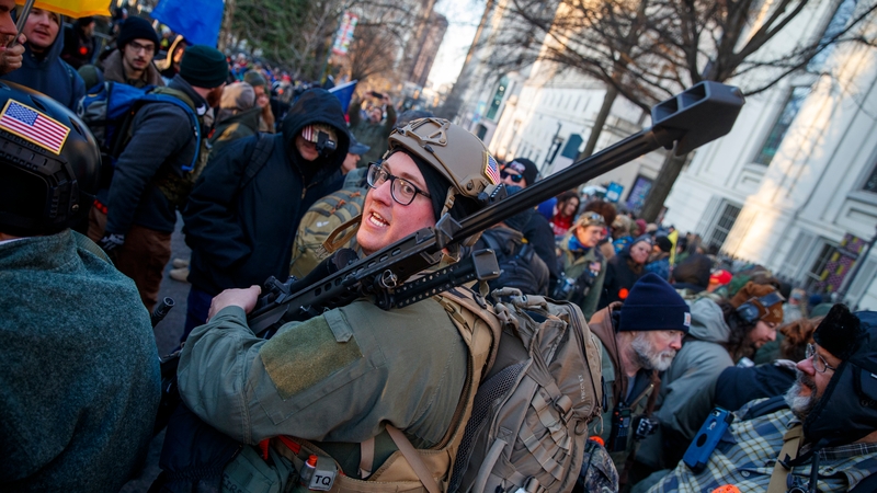 Gun-rights supporters gather for a rally outside the Virginia state capitol in Richmond
