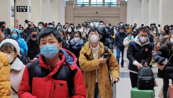 Airlines are on guard against a new flu-like virus that originated in Wuhan