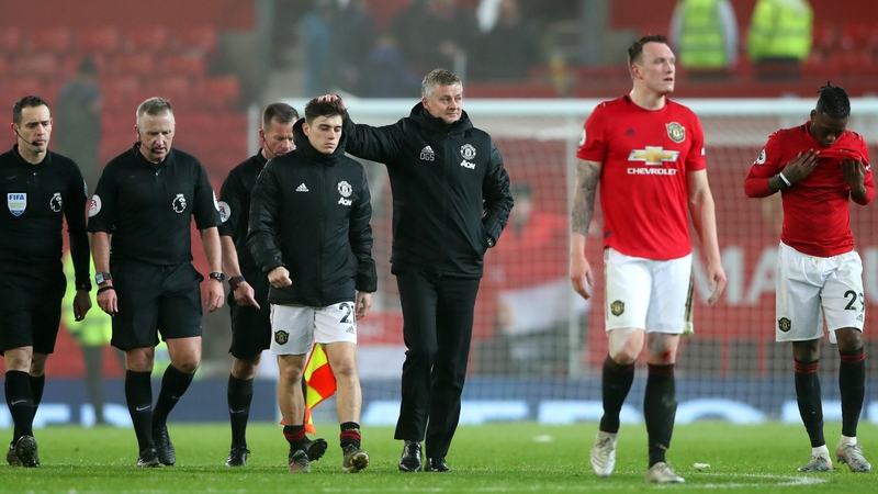 Manchester United manager Ole Gunnar Solskjaer consoles Daniel James