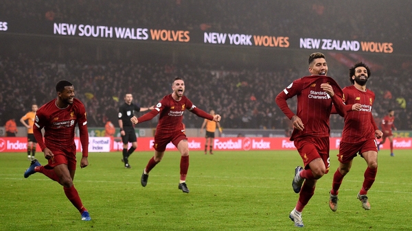 Roberto Firmino celebrate having scored the winner at Wolves