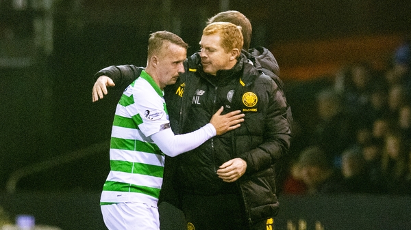 Celtic manager Neil Lennon (R) with Leigh Griffiths