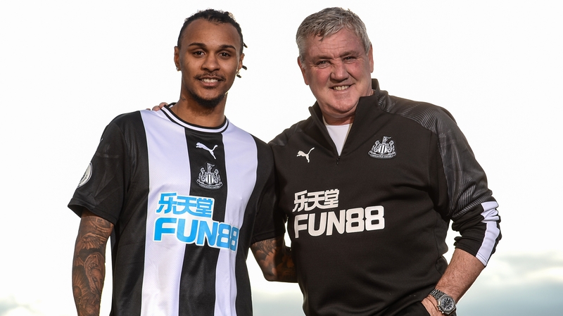 Valentino Lazaro (L) with Newcastle United boss Steve Bruce