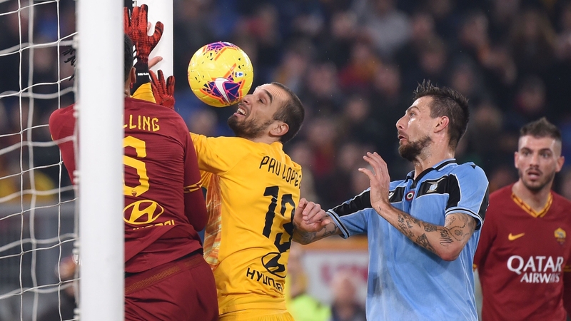 Lazio's Francesco Acerbi equalises despite the best efforts of Roma keeper Pau Lopez and Chris Smalling.
