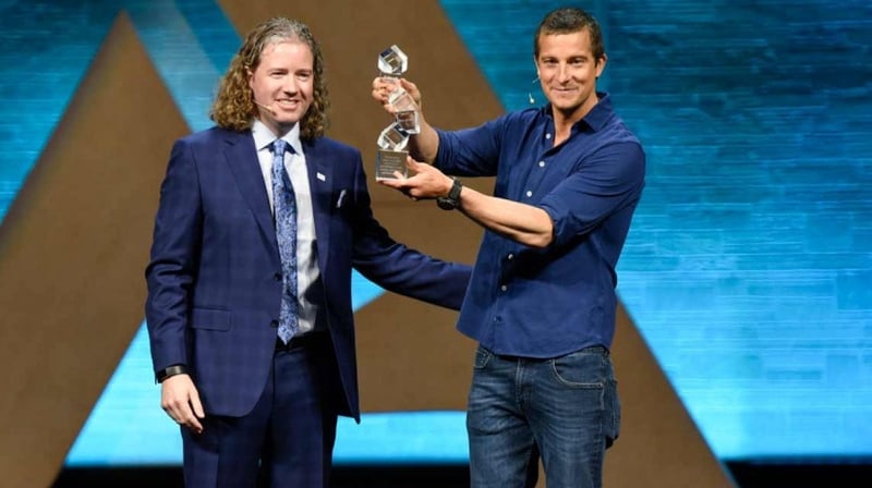 Mark Lyons from Alltech presenting survival expert Bear Grylls with the Alltech Humanitarian Award last year