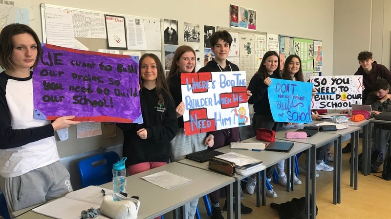 Stepaside Secondary School students prepare posters for the march