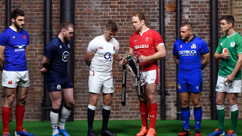 Johnny Sexton (r) is the Ireland captain who's aiming to get his hands back in the trophy