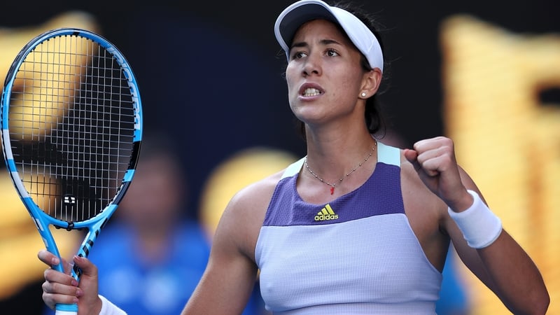 Garbine Muguruza celebrates her victory over Simona Halep