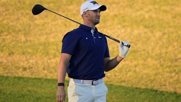 Wyndham Clark looks on after driving from the eighth tee at TPC Scottsdale