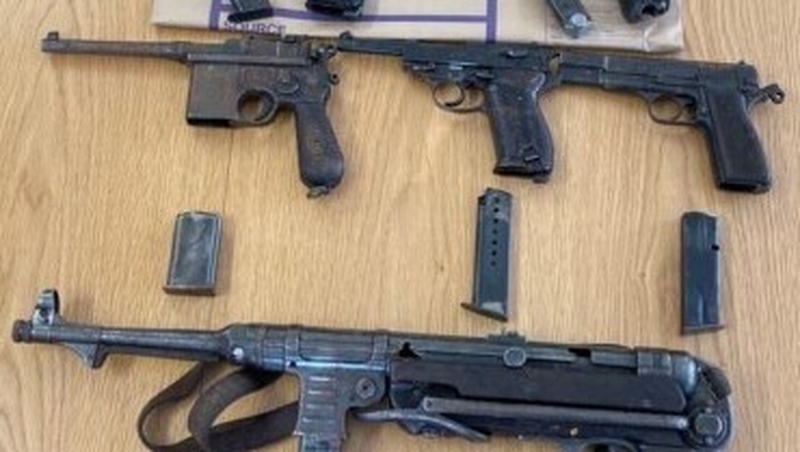The guns were found during searches on the Naas Road