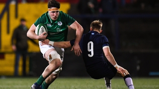 Ireland's David McCann is tackled by Roan Frostwick of Scotland