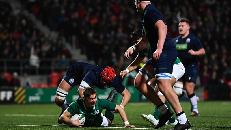 Jack Crowley goes over for Ireland's first try against Scotland