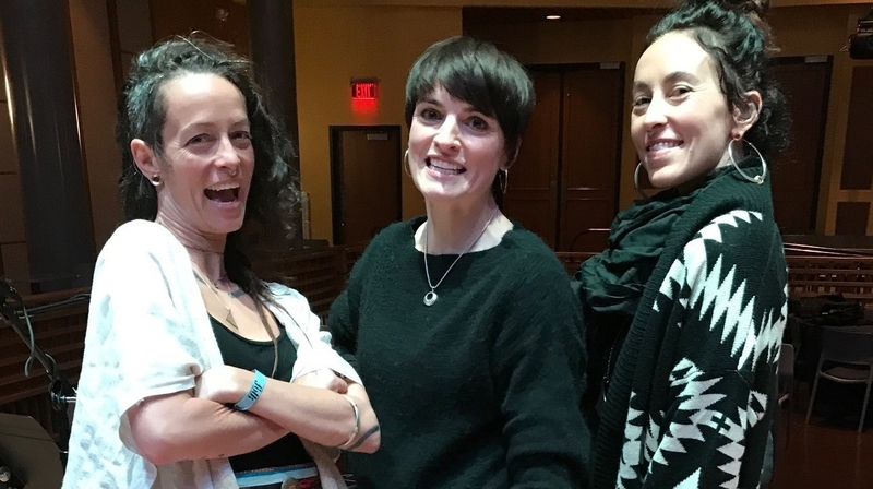 Simply Folk host Ruth Smith (centre) in New Orleans with musical duo Rising Appalachia