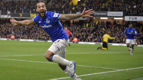 Theo Walcott celebrates his late winner as Everton fought back to take all three points