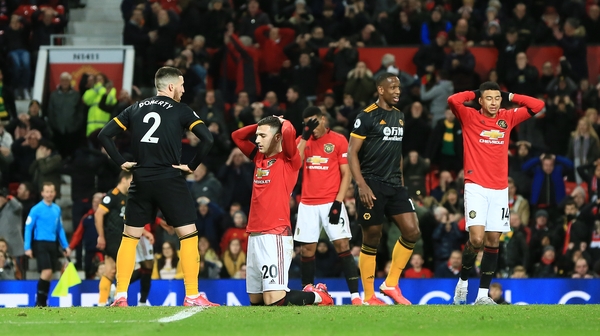 Diogo Dalot of Manchester United reacts to a missed chance against Wolves