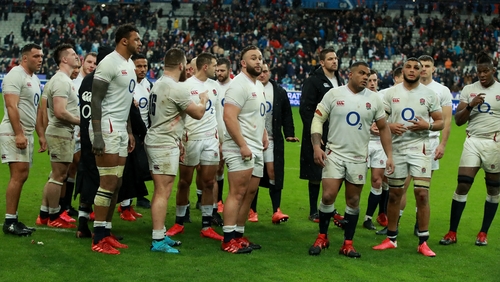 Dejected England players after the final whistle in Paris