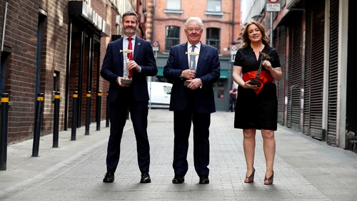 Liam O'Brien from Vodafone, Stephen Vernon and Adrienne Stack with their awards (Pic: Jason Clarke)