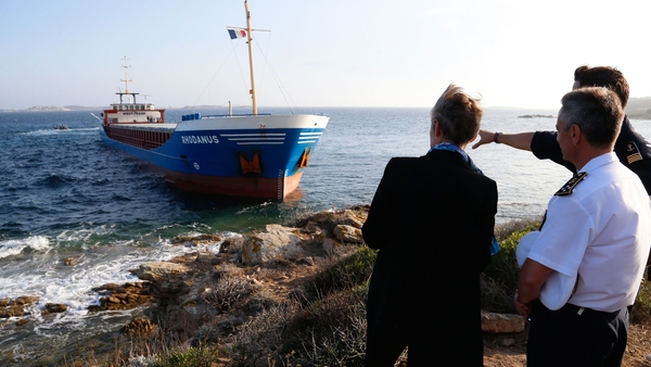 French Minister for the Ecological and Inclusive Transition Elisabeth Borne and Maritime Prefect Laurent Isnard look at the stranded ship