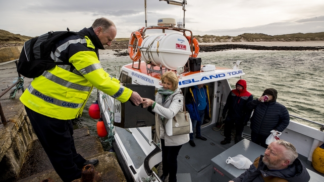 Garda Tom McBride is there to oversee proceedings and help take the ballot box off the boat