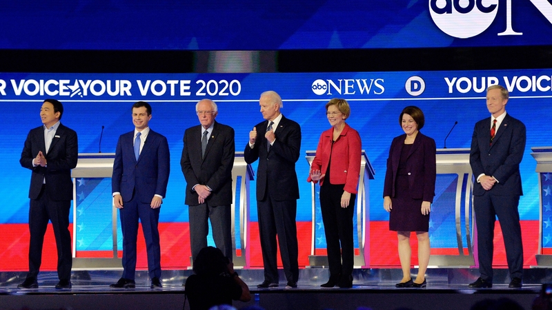 Democratic hopefuls at the debate (L-R) Andrew Yang, Pete Buttigieg, Bernie Sanders, Joe Biden, Elizabeth Warren, Amy Klobuchar and Tom Steyer
