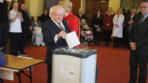 President Michael D Higgins and his wife Sabina cast their votes at St Mary's Hospital in Dublin