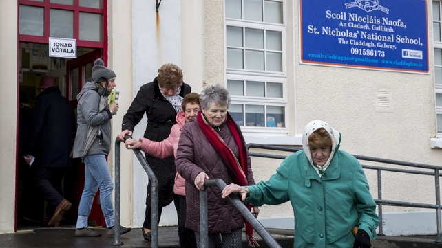 People leaving the polling station at Scoil Nicolais Naofa in Galway