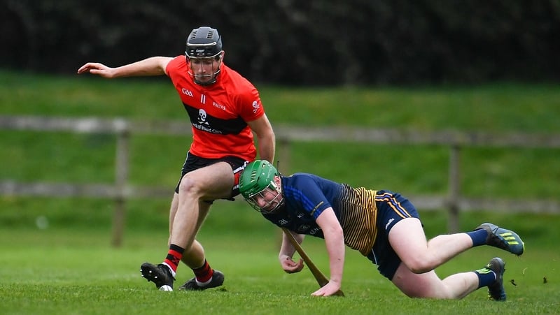 Conor Boylan of UCC in action against Evan Shefflin of DCU