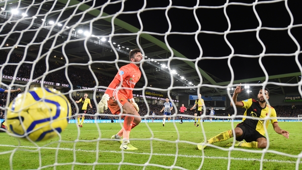Adrian Mariappa puts the ball into his own net