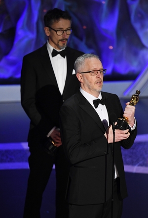 Stuart Wilson and Mark Taylor accept the Best Sound Mixing award for 1917