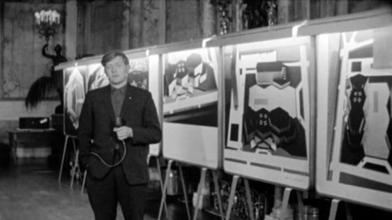 Reporter Mike Burns in Iveagh House with plans for the John F Kennedy Memorial Hall (1965)