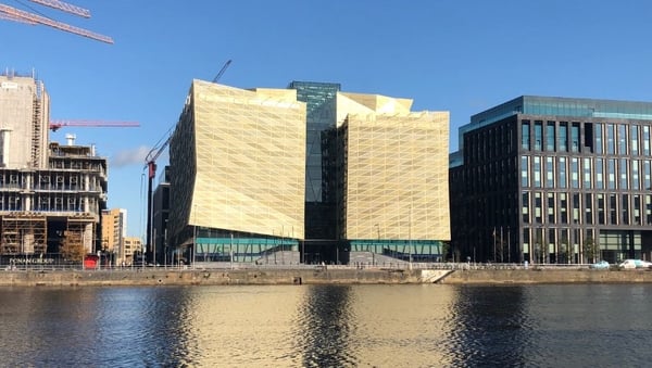 The front of the Central Bank Dublin with the River Liffey in the foreground