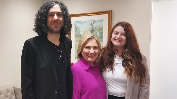 Emma DeSouza and her husband Jake with Hilary Clinton